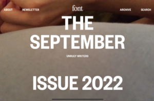 The cover image of a magazine. The text, “unruly writers Font September issue 2022”, issue written over a white arm strewn over a blanket. 